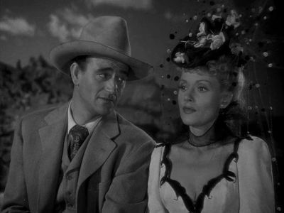 John Wayne and Martha Scott in In Old Oklahoma (1943)
