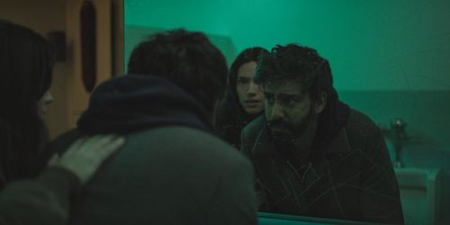 Rahul Kohli and Katie Parker in Next Exit (2022)