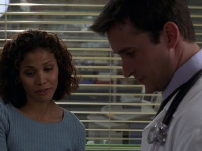 Noah Wyle and Lourdes Benedicto in ER (1994)