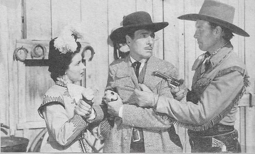 Bill Elliott, Robert Fiske, and Carmen Morales in The Valley of Vanishing Men (1942)