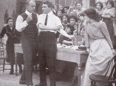 Stuart Holmes, Tom Moore, and Lottie Pickford in The Girl Strikers (1912)