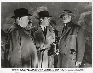 Humphrey Bogart, Sydney Greenstreet, and James Flavin in Conflict (1945)