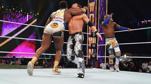 John Hennigan, Kofi Kingston, and Ettore Ewen in WWE Super Show-Down (2020)