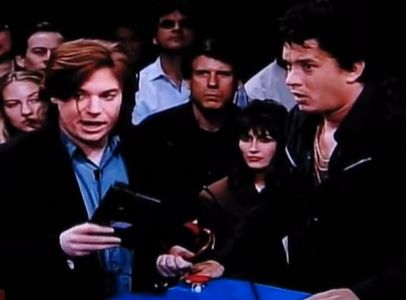 Dan Gifford Between Mike Meyers and Tom Hanks in Sabra Price is Right sketch. Saturday Night Live. May 9, 1992 Season 17