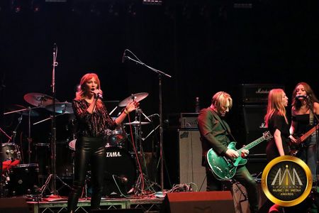 Julia Aks performing with Tyler Bates at the Hollywood Music in Media Awards
