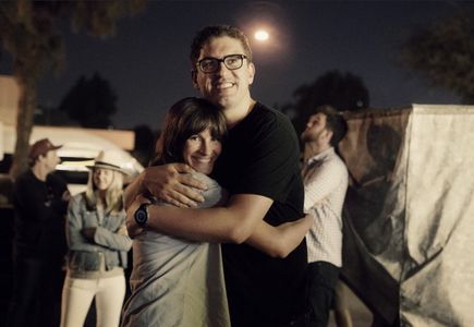 Julia Roberts and Sam Esmail embrace after wrapping season 1 of 