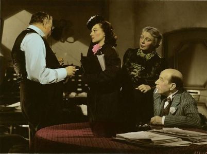 Joan Crawford, Connie Gilchrist, Donald Meek, and Reginald Owen in A Woman's Face (1941)