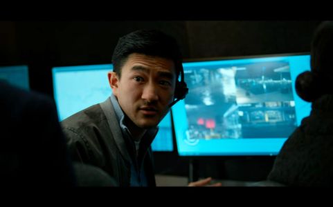Brian Law as CIA Agent Tao in Treason (2022)