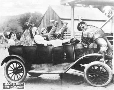 Oliver Hardy, Jimmy Aubrey, Rosa Gore, and Leila McCarthy in The Nuisance (1921)
