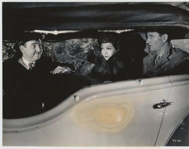 John Wayne, Claudette Colbert, and Charles Arnt in Without Reservations (1946)