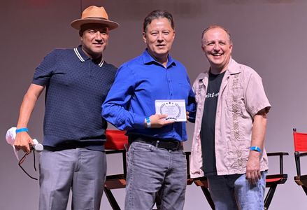 'The Kill Floor' Writer, Producer, Director Carlos Avila (center) receives the award for Best in Show and the Audience A