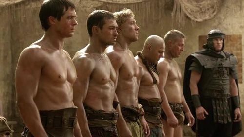 Andy Whitfield, Jai Courtney, and Kyle Pryor in Spartacus (2010)