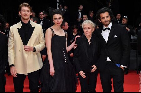 Joe Alwyn, Margaret Qualley, Claire Denis, and Nick Romano at The Cannes Film Festival Premiere of Stars at Noon.