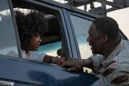 Idris Elba and Leah Jeffries in Beast (2022)