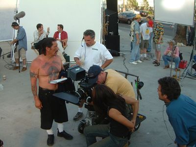 Director Bob Hilgenberg sets up a shot with actor Danny Trejo.