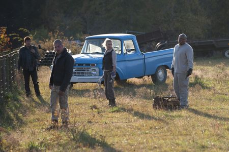 Norman Reedus, Laurie Holden, Jon Bernthal, and Irone Singleton in The Walking Dead (2010)