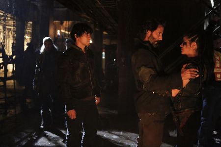Henry Ian Cusick, Bob Morley, and Marie Avgeropoulos in The 100 (2014)