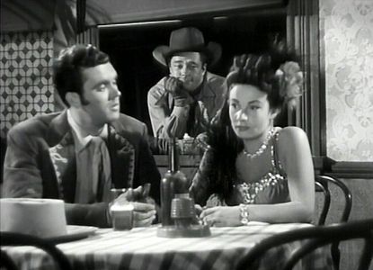 Tim Holt, Rita Lynn, and Richard Martin in Western Heritage (1948)