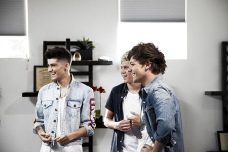 Zayn Malik, Niall Horan, and Louis Tomlinson in One Direction: This Is Us (2013)