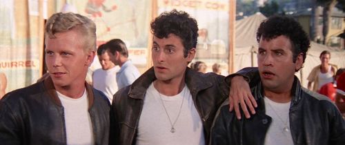 Barry Pearl, Michael Tucci, and Kelly Ward in Grease (1978)