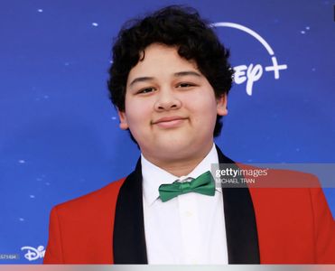 Liam Kyle at the white carpet premiere of Disney+'s The Santa Clauses