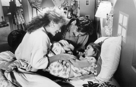 Tom Selleck, Nancy Travis, and Robin Weisman in Three Men and a Little Lady (1990)