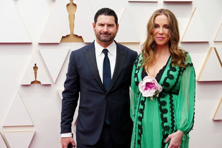 Producer Javier Chapa and Producer Mary Parent attend the 94th Annual Academy Awards