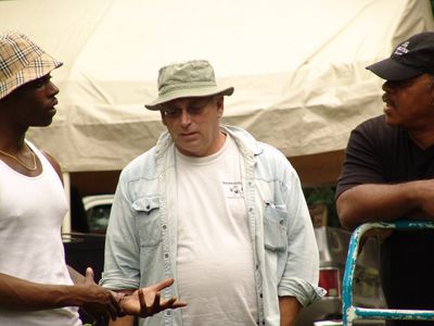 Still of Shane Dean giving direction to Garry Chalk and Nathaniel Deveaux on the set of Under The Sycamore Tree