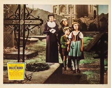 Shirley Temple, Eddie Collins, Johnny Russell, and Gale Sondergaard in The Blue Bird (1940)