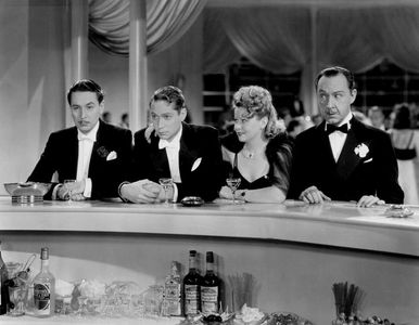 Reginald Gardiner, Franklin Pangborn, Barbara Pepper, and Franchot Tone in The Girl Downstairs (1938)
