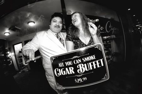 Still of Paul Vato and Sarah Vato (VI) on the set of Last Vegas. Paul Vato owns Vato Cigars, inside Binion's Casino on F