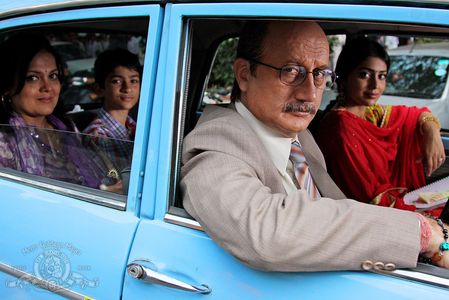 Anupam Kher, Sushmita Mukherjee, Shriya Saran, and Jai Thade in The Other End of the Line (2007)