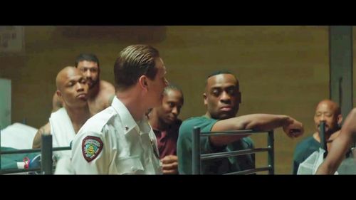 Screen shot from the 2019 Movie 'The Informer'. Kenny-Lee Mbanefo playing the role of an intimidating Prison Inmate