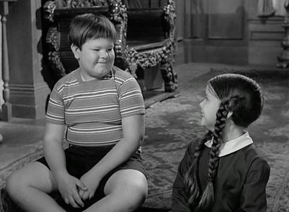 Lisa Loring and Ken Weatherwax in The Addams Family (1964)
