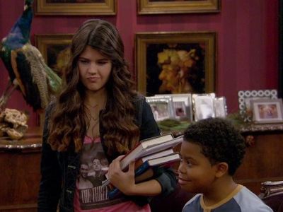 Amber Frank and Benjamin Flores Jr. in The Haunted Hathaways (2013)