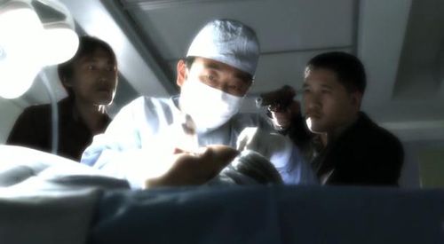 Jin Yang, Robert Dahey, and David Tran in CSI: Crime Scene Investigation (2000)