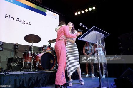 Fin Argus and Geena Davis embrace during the Bentonville Film Festival Awards Ceremony on June 25, 2022