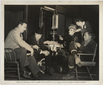 Marlene Dietrich, Richard Barthelmess, Harry Carey, and Ray Enright in The Spoilers (1942)