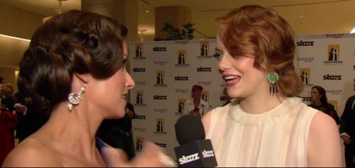 Kristin Adams interviews Emma Stone on the red carpet at the Hollywood Awards presented by Starz!