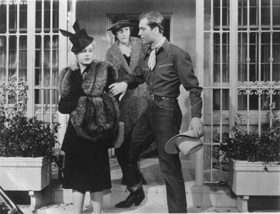 Mary Beth Hughes, George Montgomery, and Minerva Urecal in The Cowboy and the Blonde (1941)