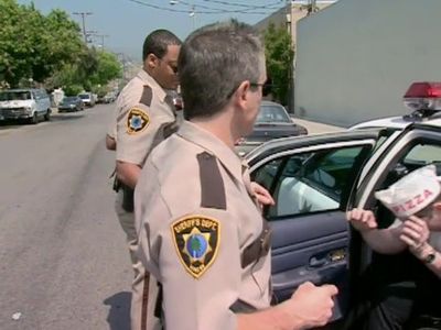 Carlos Alazraqui and Cedric Yarbrough in Reno 911! (2003)