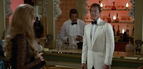 Roger Moore and Kristina Wayborn in Octopussy (1983)