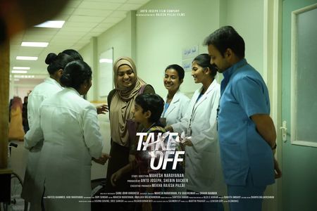 Kunchacko Boban, Parvathy Thiruvothu, Divya Prabha, Eric Zachariah, and Sreeja Das in Take Off (2017)