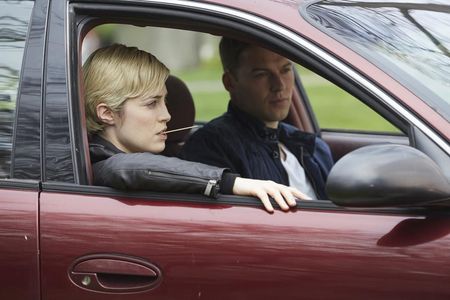 Charlotte Sullivan and Peter Mooney in Rookie Blue (2010)