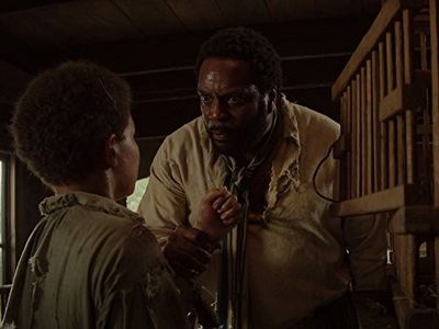 Chad L. Coleman and Jaylin Ogle in Roots (2016)