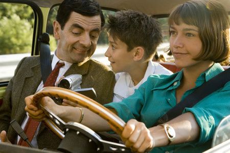 Rowan Atkinson, Emma de Caunes, and Maxim Baldry in Mr. Bean's Holiday (2007)