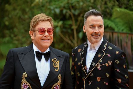 Elton John and David Furnish at an event for The Lion King (2019)