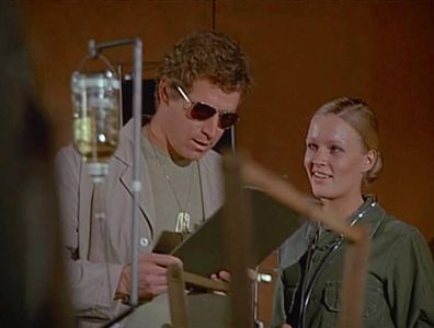 Wayne Rogers and Sheila Lauritsen in M*A*S*H (1972)
