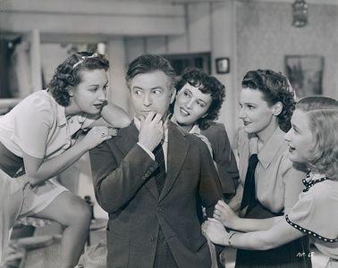 Claude Rains, Lola Lane, Priscilla Lane, Rosemary Lane, and Gale Page in Daughters Courageous (1939)