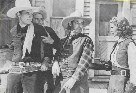 Dick Botiller, Al Bridge, Iris Meredith, and Charles Starrett in The Man from Sundown (1939)